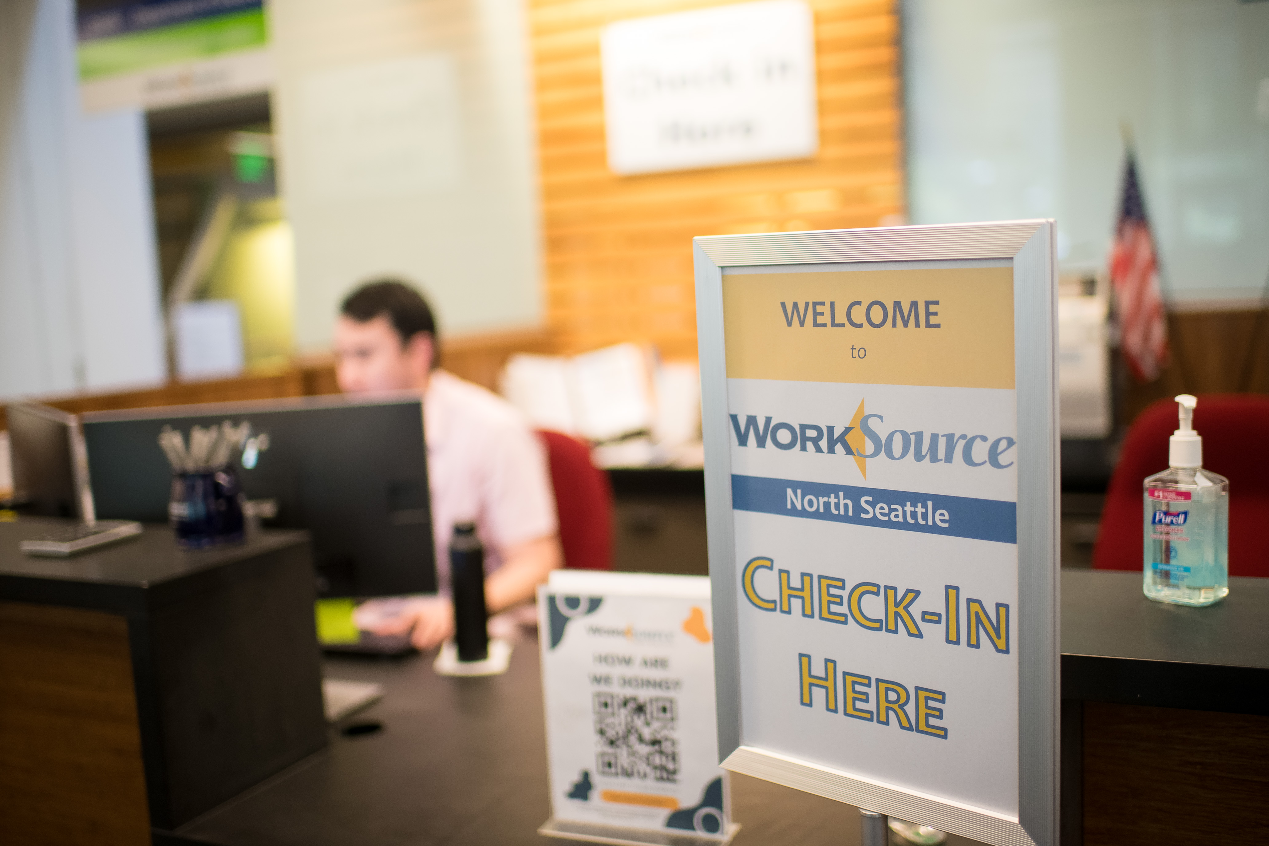 Welcome to Worksource North seattle check in here sign with hand sanitizer and pens