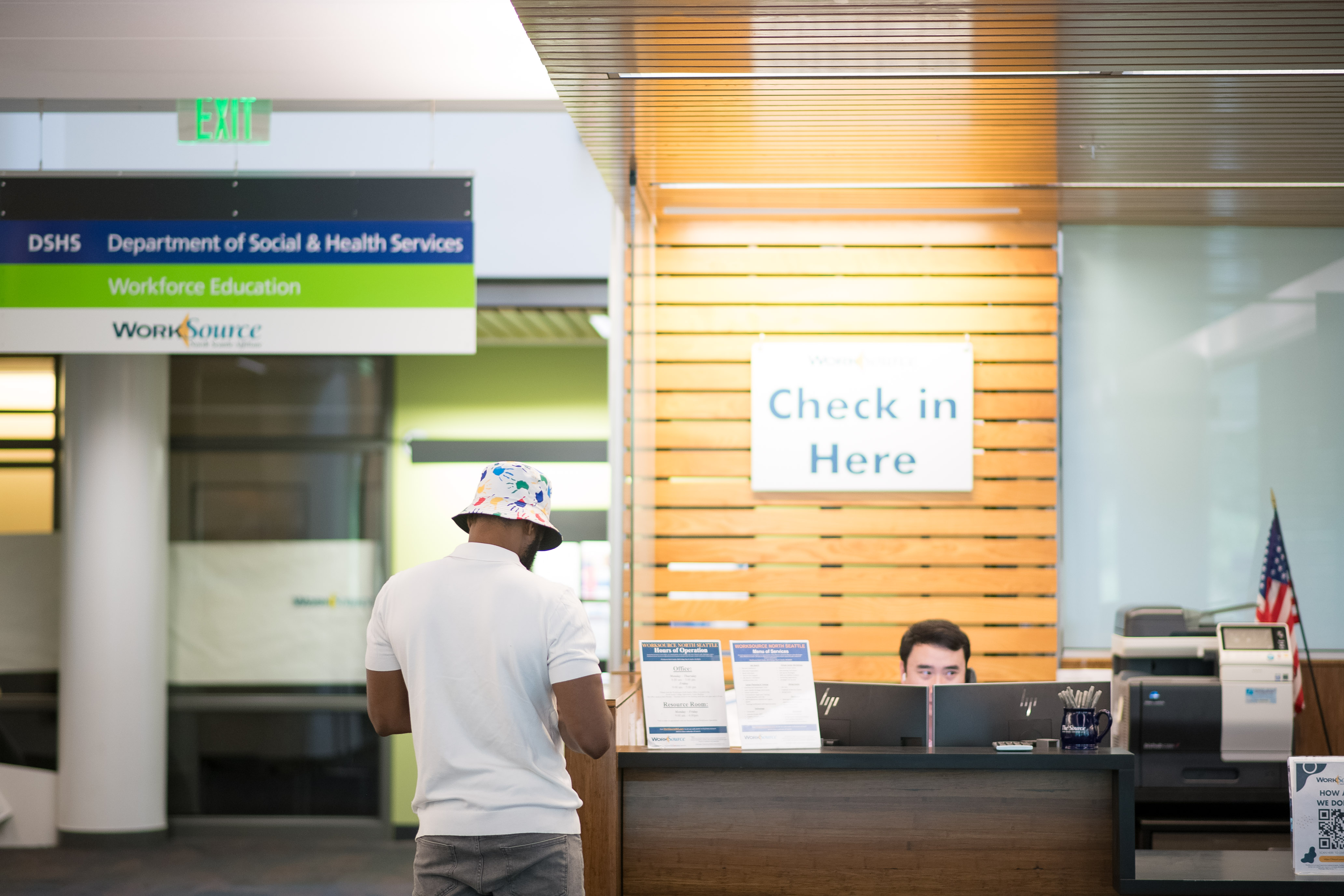 Check in Here sign at front desk of Workforce education center