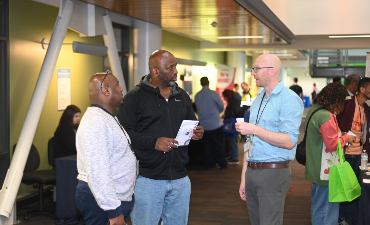 Veterans job fair staff help visitors